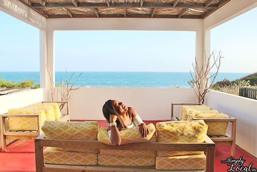 Turtles Nest Villa woman laughing on patio