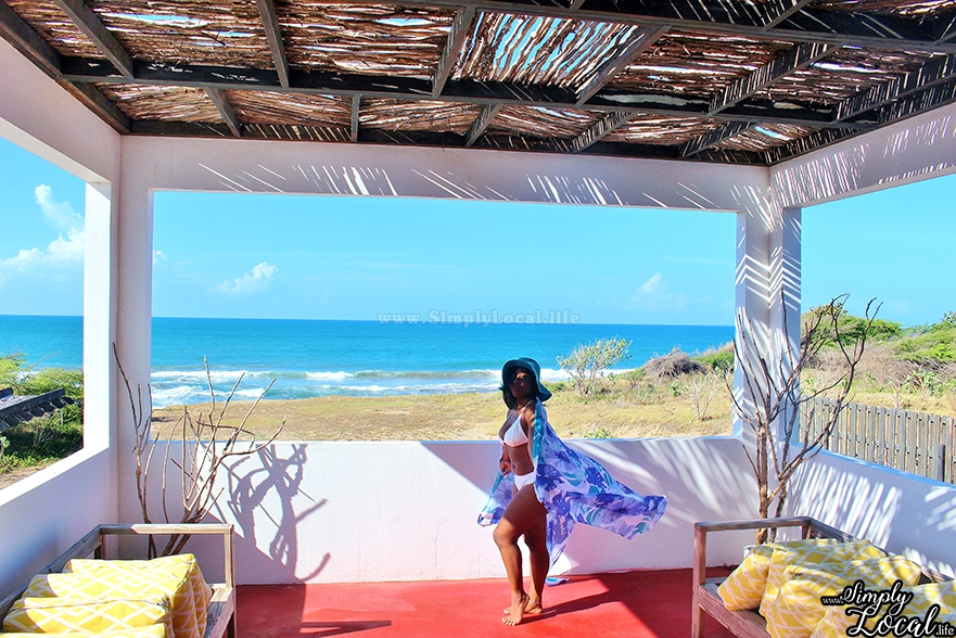 Turtles Nest Treasure Beach Jamaica Villa woman with sarong flowing beach