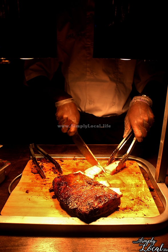 Chef cutting pork belly